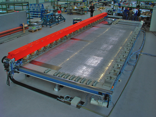 Clamping fixture for machining cylindrical pre-formed air craft fuselage parts